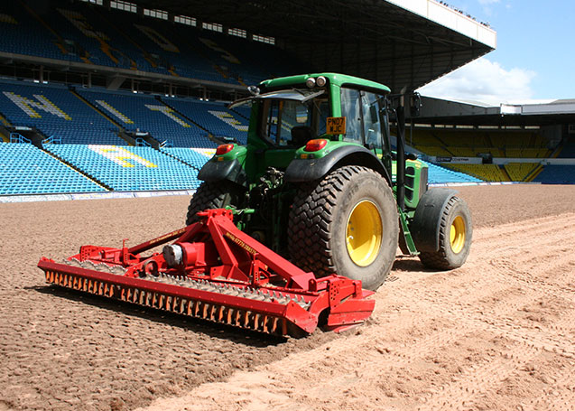 fibre sand being laid by machine
